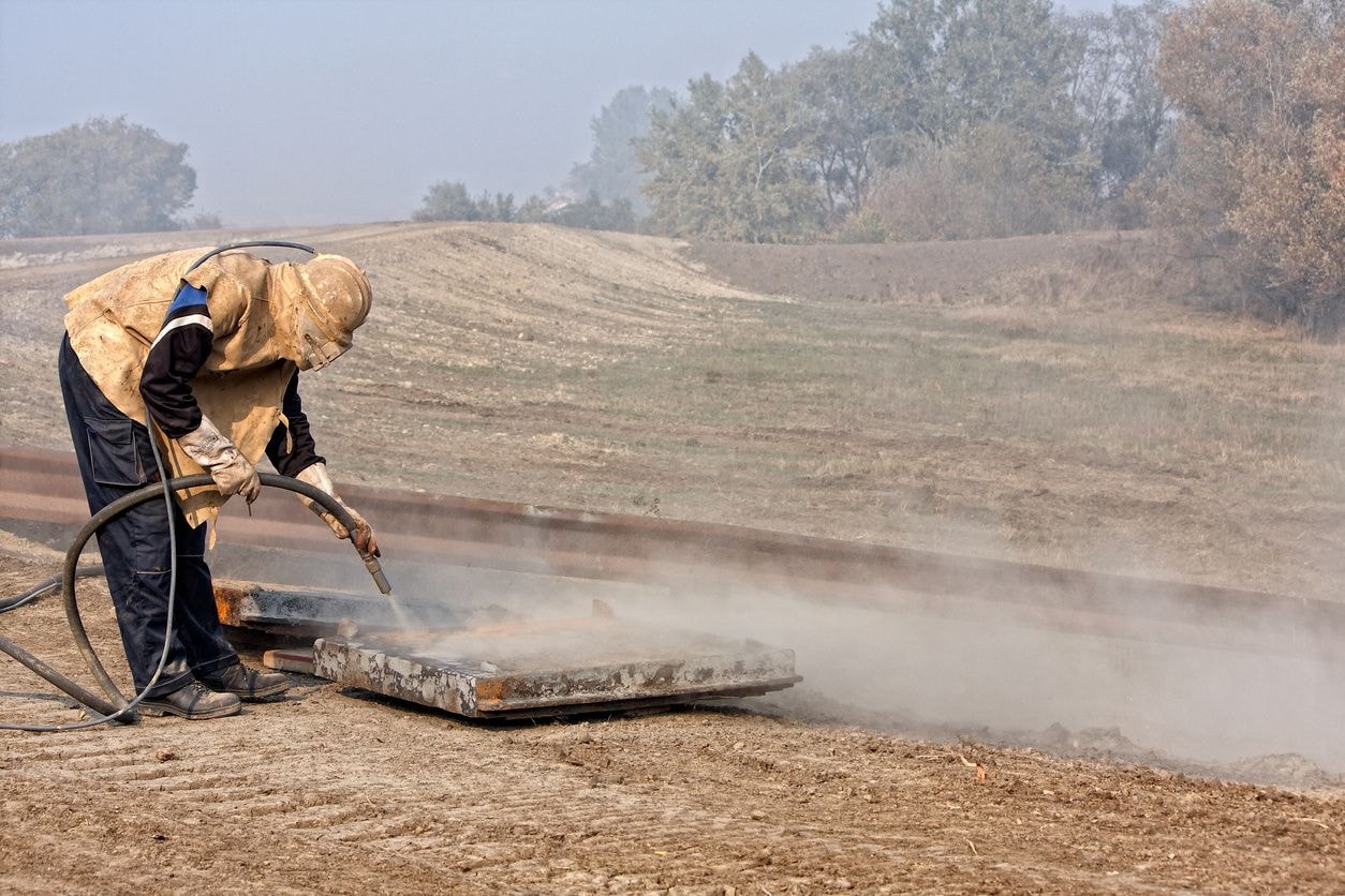 Field soda blasting on metal surface — Bob's Blasting Service